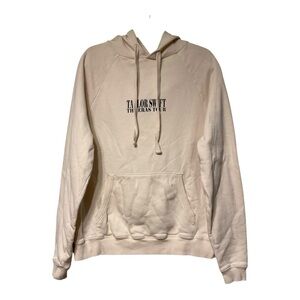 Taylor Swift The Eras Tour beige graphic hoodie S collage of images on the back.